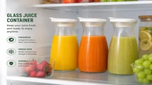 Glass juice container neatly stored in a refrigerator with different fresh fruit juices