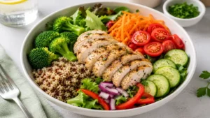 Healthy grilled chicken and vegetable bowl prepared as flavorful weight watchers lunch meals.